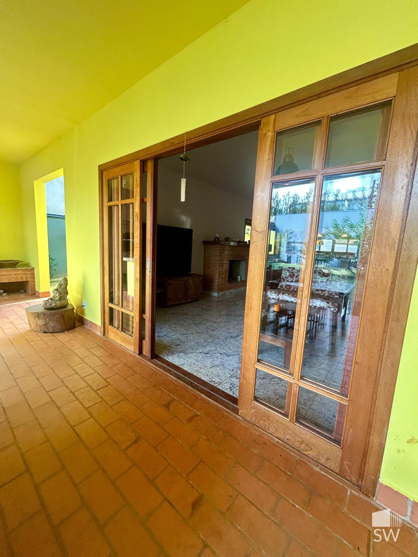 Varanda com piso de tijolinho